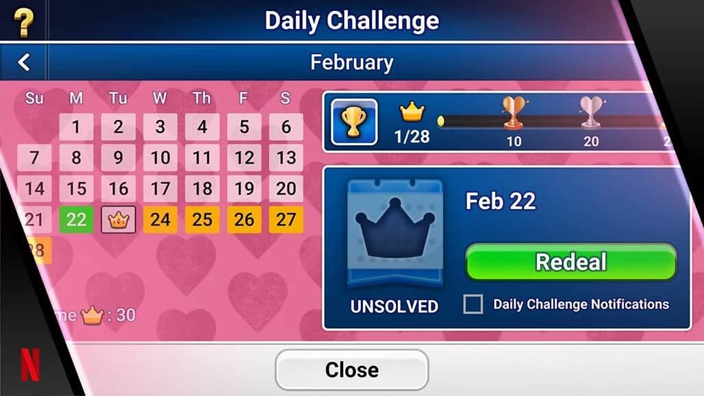 Screenshot van de Daily Challenge-kalender voor februari in een Classic Solitaire-game op Netflix